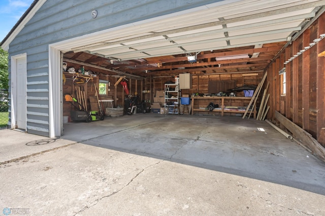 1706 14 1/2 St S, Fargo, ND 58103 - garage with a garage door opener and driveway