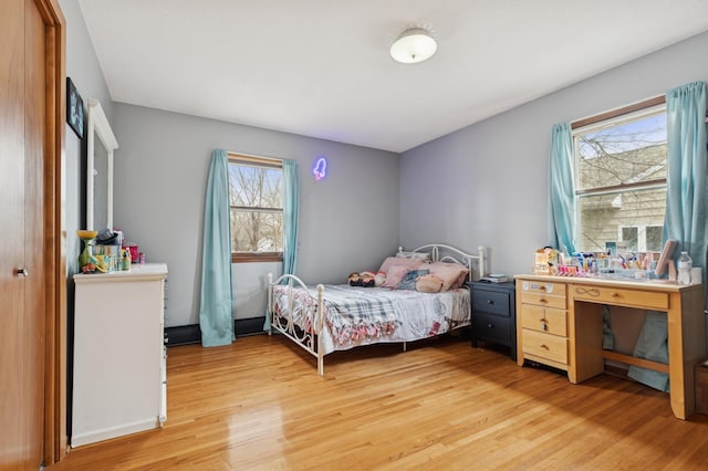 620 8th St SW, Faribault, MN 55021 - bedroom with light wood finished floors