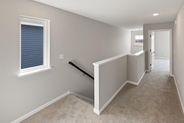 7861 Ramsey Pkwy NW, Ramsey, MN 55303 - hall featuring an upstairs landing and carpet flooring