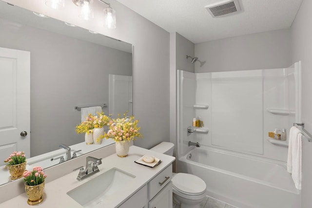 7861 Ramsey Pkwy NW, Ramsey, MN 55303 - full bathroom with vanity, washtub / shower combination, a textured ceiling, and tile patterned floors