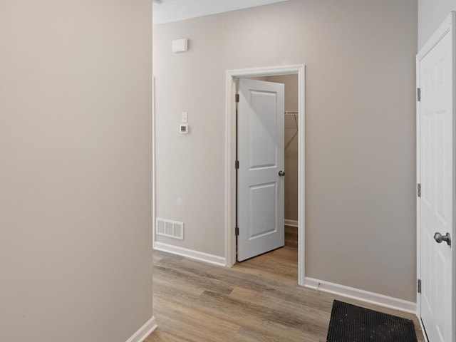 7855 Ramsey Pkwy NW, Ramsey, MN 55303 - hall featuring light wood-style flooring and baseboards