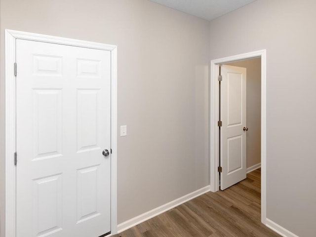 7855 Ramsey Pkwy NW, Ramsey, MN 55303 - corridor with wood finished floors and baseboards