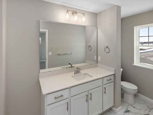 7855 Ramsey Pkwy NW, Ramsey, MN 55303 - bathroom with vanity and marble finish floors