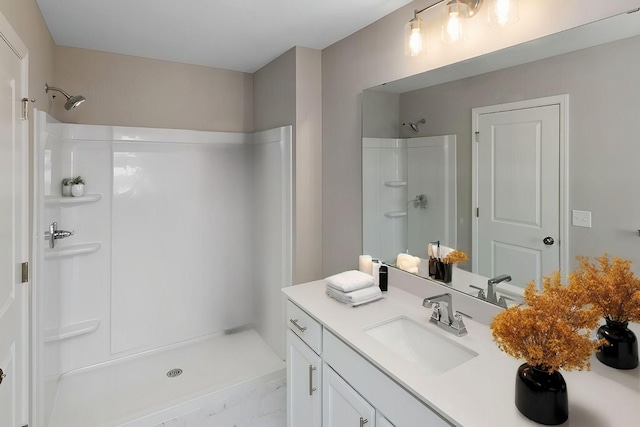 7855 Ramsey Pkwy NW, Ramsey, MN 55303 - bathroom featuring a shower, vanity, and marble look tile flooring