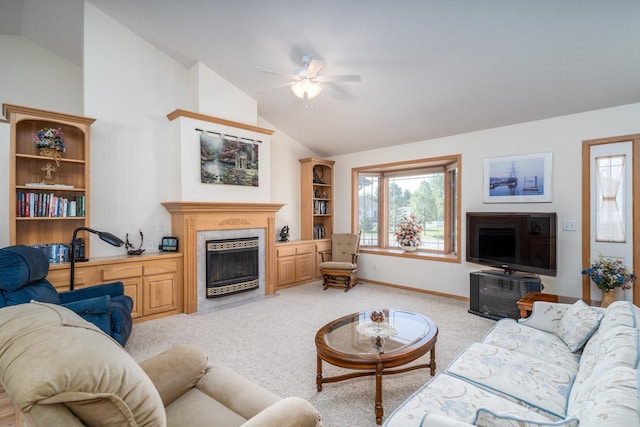 521 Spruce Ln, Crookston, MN 56716 - living room with a fireplace with flush hearth, lofted ceiling, ceiling fan, and light colored carpet