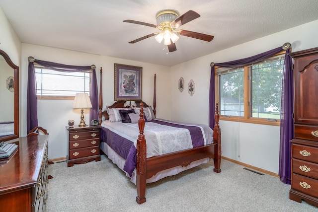 521 Spruce Ln, Crookston, MN 56716 - bedroom featuring light colored carpet and ceiling fan