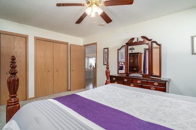 521 Spruce Ln, Crookston, MN 56716 - bedroom with multiple closets and ceiling fan