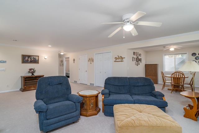 521 Spruce Ln, Crookston, MN 56716 - living area with light carpet, ceiling fan, and crown molding