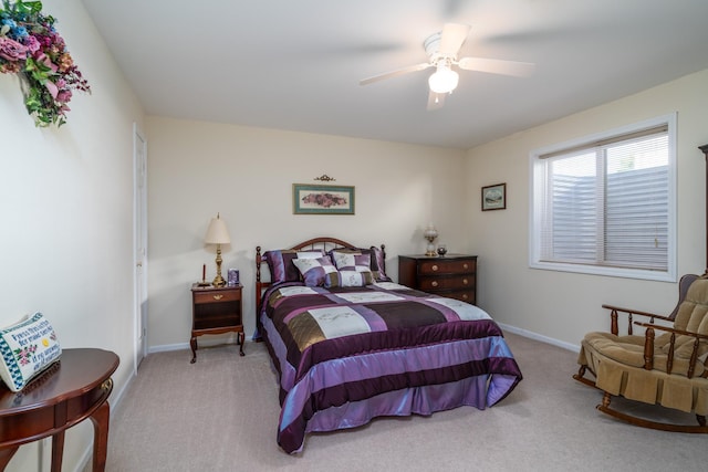 521 Spruce Ln, Crookston, MN 56716 - carpeted bedroom with baseboards and a ceiling fan