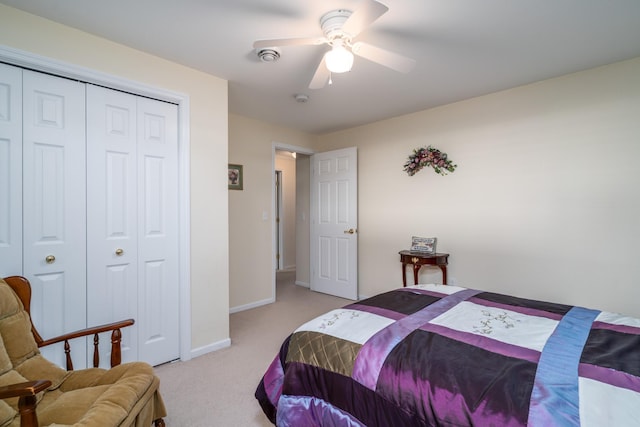 521 Spruce Ln, Crookston, MN 56716 - bedroom with light colored carpet, a closet, and ceiling fan