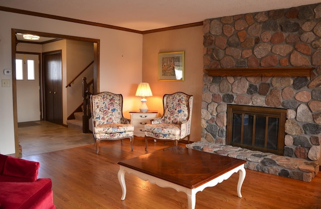 4336 Lookout Ln, Red Wing, MN 55066 - living room with ornamental molding, wood finished floors, stairs, and a fireplace