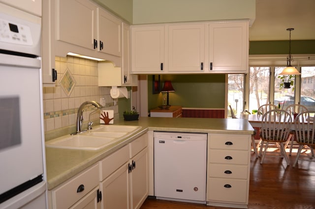 4336 Lookout Ln, Red Wing, MN 55066 - kitchen featuring white dishwasher, a peninsula, white cabinets, and light countertops