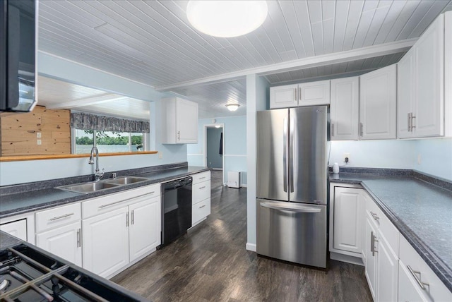 773 US Highway 63, Clayton, WI 54004 - kitchen with freestanding refrigerator, black dishwasher, a wooden ceiling with exposed beams, dark countertops, and dark wood finished floors