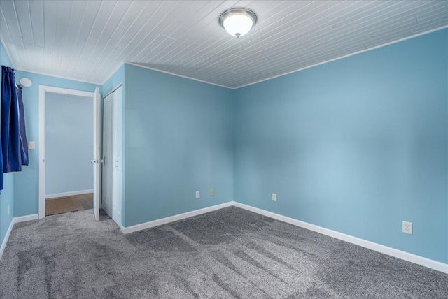 773 US Highway 63, Clayton, WI 54004 - empty room featuring carpet flooring and wooden ceiling