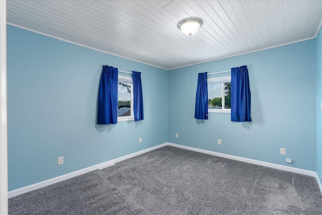 773 US Highway 63, Clayton, WI 54004 - unfurnished room featuring carpet and wood ceiling