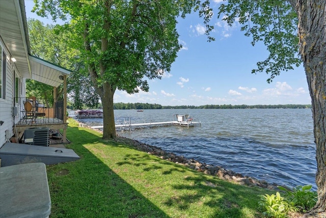 773 US Highway 63, Clayton, WI 54004 - dock area with a water view and a lawn