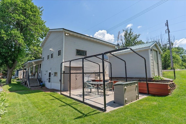 773 US Highway 63, Clayton, WI 54004 - rear view of property featuring a lawn and a patio area