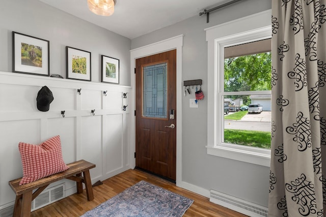 771 Creek Ave, Mendota Heights, MN 55120 - mudroom with plenty of natural light, light wood-type flooring, and a baseboard radiator