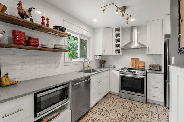 771 Creek Ave, Mendota Heights, MN 55120 - kitchen featuring stainless steel appliances, wall chimney range hood, open shelves, backsplash, and recessed lighting
