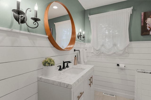771 Creek Ave, Mendota Heights, MN 55120 - bathroom featuring vanity and wainscoting