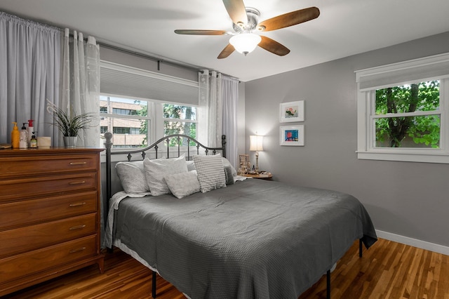 771 Creek Ave, Mendota Heights, MN 55120 - bedroom featuring multiple windows, wood finished floors, and a ceiling fan