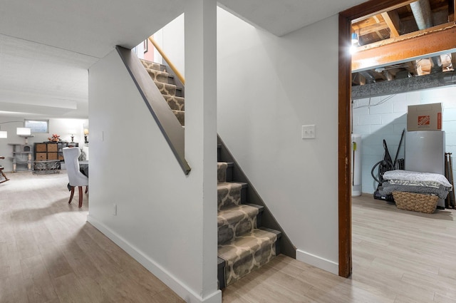 771 Creek Ave, Mendota Heights, MN 55120 - stairs with wood finished floors and baseboards