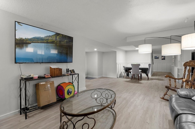 771 Creek Ave, Mendota Heights, MN 55120 - living room featuring wood finished floors and a textured ceiling