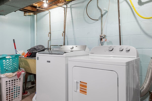 771 Creek Ave, Mendota Heights, MN 55120 - washroom featuring washing machine and clothes dryer and concrete block wall