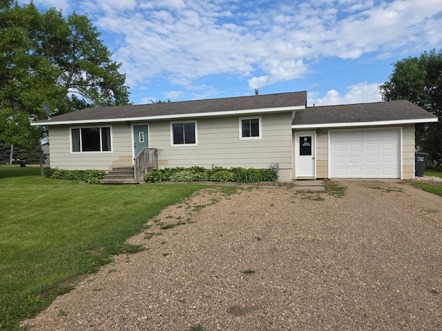 266 6th St, Hancock, MN 56244 - ranch-style home with driveway, an attached garage, and a front yard