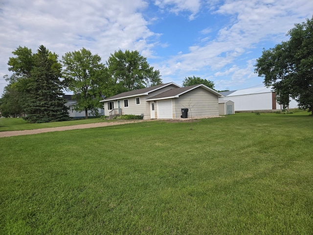266 6th St, Hancock, MN 56244 - single story home with a storage unit, a front yard, and a garage