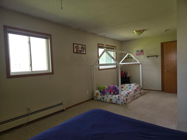 266 6th St, Hancock, MN 56244 - game room with a baseboard radiator, carpet floors, and a textured ceiling
