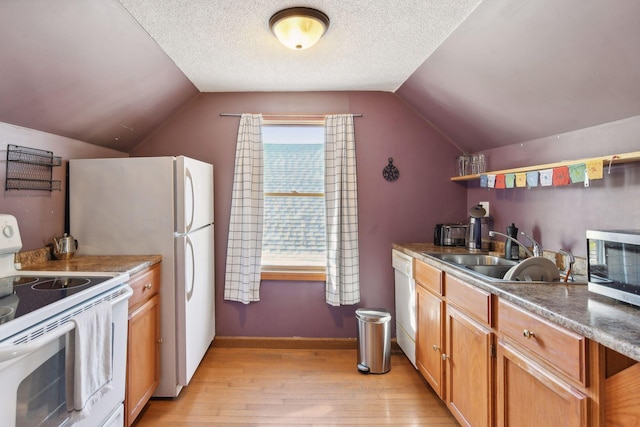 104 27th St, Minneapolis, MN 55408 - kitchen featuring white appliances, light wood finished floors, vaulted ceiling, open shelves, and brown cabinets