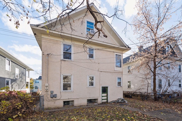 104 27th St, Minneapolis, MN 55408 - back of house with stucco siding