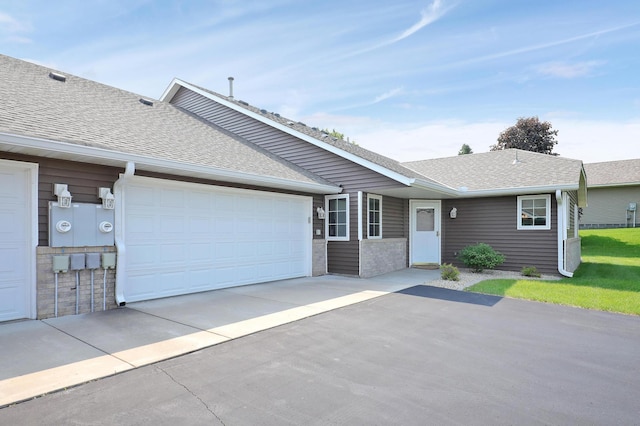 6105 Creekview Ln N, Brooklyn Park, MN 55443 - ranch-style home with driveway, roof with shingles, and a garage