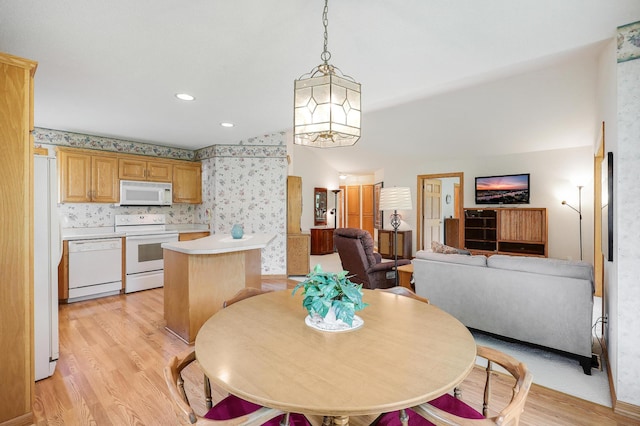 6105 Creekview Ln N, Brooklyn Park, MN 55443 - dining area featuring light wood-style flooring and wallpapered walls