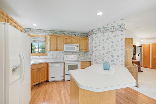 6105 Creekview Ln N, Brooklyn Park, MN 55443 - kitchen with white appliances, light countertops, wallpapered walls, light wood-style floors, and recessed lighting