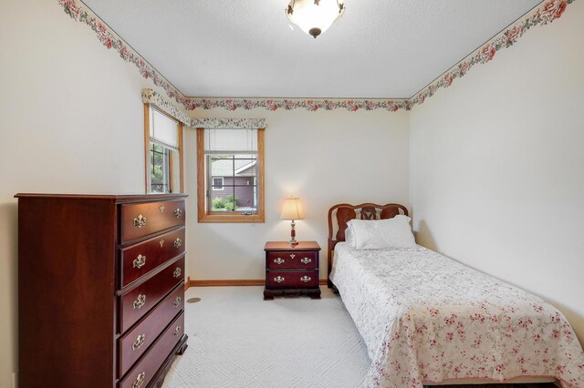 6105 Creekview Ln N, Brooklyn Park, MN 55443 - bedroom featuring light colored carpet and baseboards