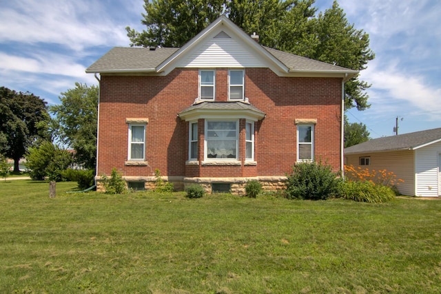 735 Broadway Ave, Wabasha, MN 55981 - view of front of home featuring brick siding and a front yard