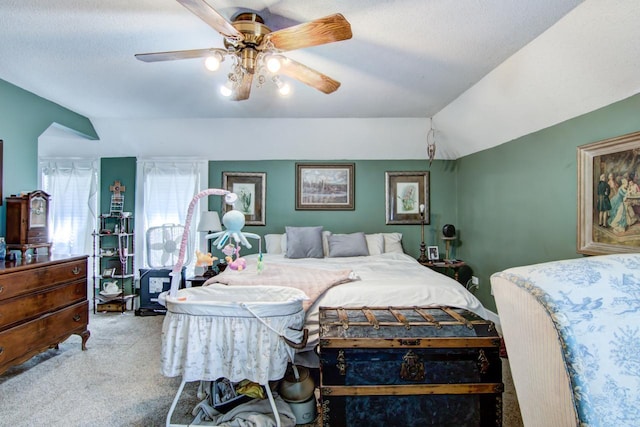 735 Broadway Ave, Wabasha, MN 55981 - carpeted bedroom with vaulted ceiling and a ceiling fan