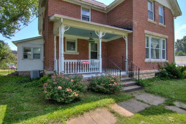 735 Broadway Ave, Wabasha, MN 55981 - view of front of home featuring a porch and brick siding