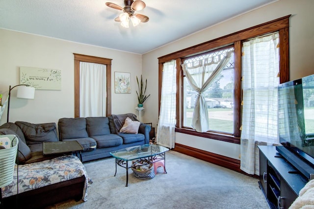 735 Broadway Ave, Wabasha, MN 55981 - living room with ceiling fan and carpet floors