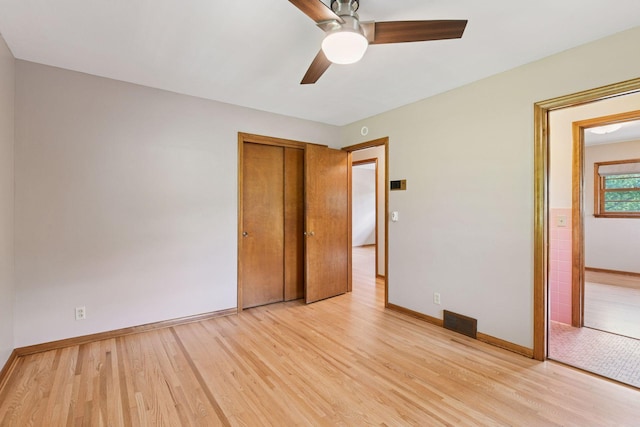 3748 Hilltop Rd, Minnetonka, MN 55305 - unfurnished bedroom featuring light wood-style flooring, a closet, and a ceiling fan
