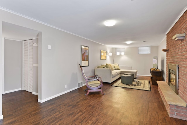 3748 Hilltop Rd, Minnetonka, MN 55305 - living room featuring wood finished floors, a fireplace, and crown molding
