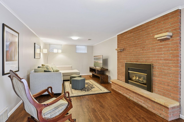 3748 Hilltop Rd, Minnetonka, MN 55305 - living area with wood finished floors, a fireplace, and ornamental molding