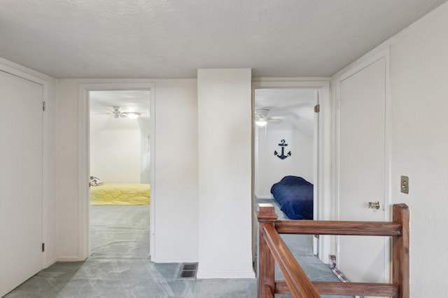 2921 Cambridge Ln, Mound, MN 55364 - corridor featuring carpet floors and a textured ceiling