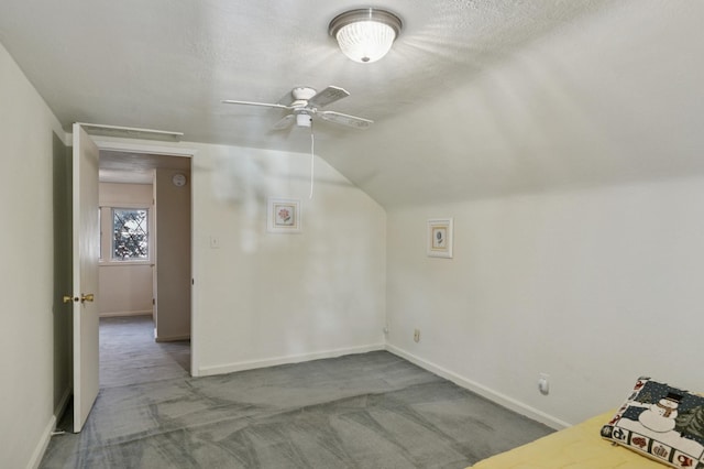 2921 Cambridge Ln, Mound, MN 55364 - additional living space featuring a ceiling fan, carpet flooring, lofted ceiling, and attic access