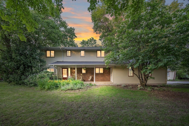 1301 Washington St, Northfield, MN 55057 - back of property featuring a yard and covered porch