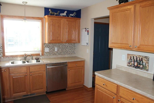 1508 6th Ave S, Sartell, MN 56377 - kitchen featuring dishwasher, wood finished floors, light countertops, tasteful backsplash, and hanging light fixtures