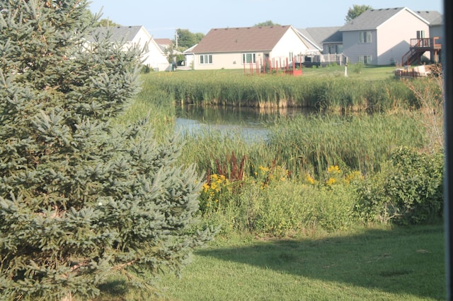 1508 6th Ave S, Sartell, MN 56377 - view of yard with a residential view and a water view