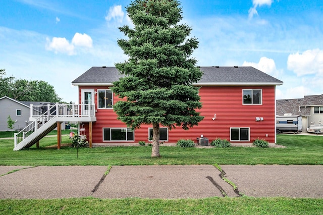 22493 Carina Ct, Farmington, MN 55024 - back of property featuring a wooden deck, stairway, a yard, and roof with shingles